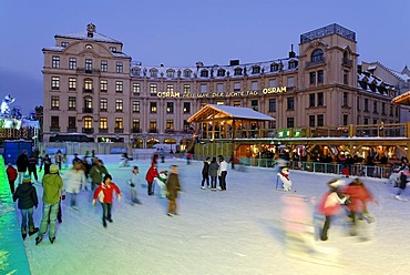 Karlsplatz Stachus ice-skating on a artificial scating ring Munich Upper Bavaria Germany