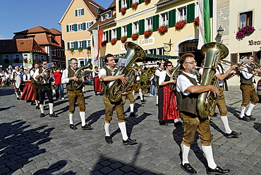 Parade with traditional costumes Marktplatz market square Feuchtwangen Middle Franconia Bavaria Germany