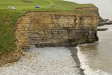 Cars parked on a cliff, steep coast, Nash Point, Glamorgan Heritage Coast, Wales, Great Britain, Europe