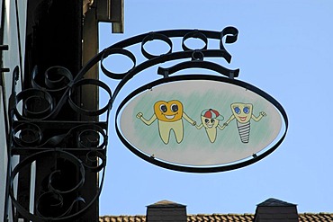 Sign for a dentist's office in the old part of Herford, North Rhine-Westphalia, Germany