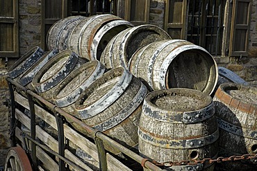 Old beer kegs on a cart in front of the brewery, Westphalian Open-Air Museum Hagen, Road of Industry Culture, North Rhine-Westphalia, Germany