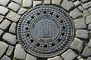 Drain cover with city coats of arms, Muenster, North Rhine-Westphalia, Germany