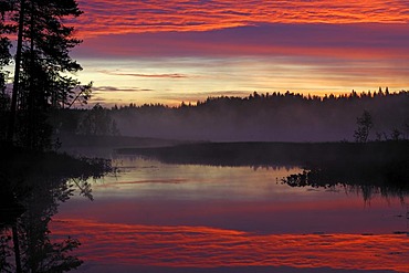 Spectacular sunrise at a Swedish raised moss lake, Dalarna, Scandinavia, Sweden, Europe