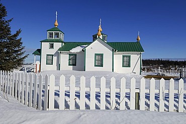 Russian-orthodox church with cemetery in winter in Ninilchik, Kenai Peninsula, Alaska, USA, North America