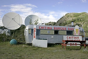 Fast food cantina and satellite dish village of Chitina Alaska USA