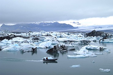 Rubber boat at the glacier lake Jokulsarlon Iceland