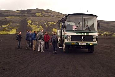 Tourist bus at the Laka Gigar volcanic area Iceland