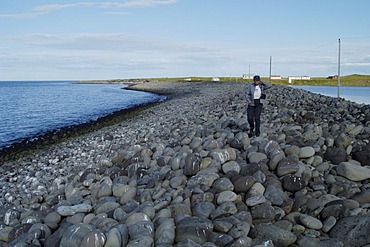 Stony bank at the farm Nupskatla on the Melrakkasletta peninsula Iceland