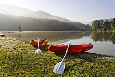 2 kayaks at the bathing lake and camping area Zenz near the mountain Hochschwab, Pichl-Grossdorf, Styria, Austria