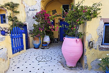 A colourful yard of a house, Oia, Santorini, Greece