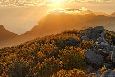 Sunrise viewed from the mountain Achada do Teixeira (1592m) with a view to the peninsule Ponta de Sao Lorenco, Madeira, Portugal