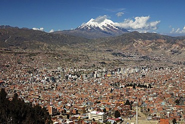 La Paz with Mt. Illimani behind, seen from El Alto, Bolivia, South America