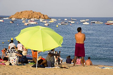 Tourists, parasol, Tossa de Mar Beach, Catalonia, Spain, Europe