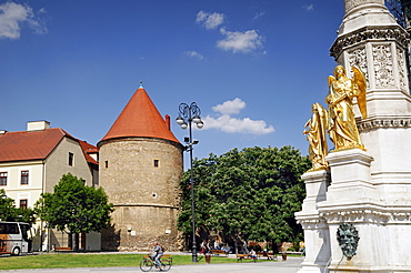 Golden statues of angels and old fortifications in the medieval old town of Kaptol, Zagreb, Croatia, Europe