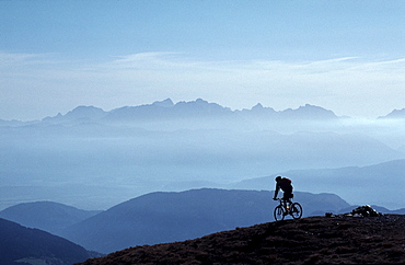 Mountain biker, Nock Mountains (Nockberge), Carinthia, Austria, Europe