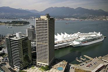 The Province publishing house and office buildings in front of Pan Pacific hotel situated at the harbour in Vancouver, British Columbia, Canada