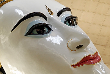 Buddha face (closeup) in Kyaukhtatkyi Pagoda, Yangon (Rangoon), Myanmar (Burma)