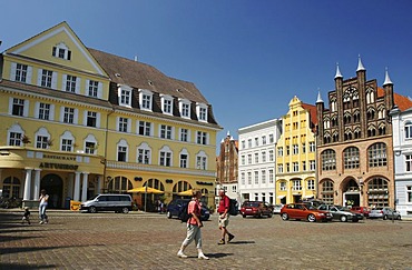 BRD Germany Mecklenburg Vorpommern City Stralsund Historical Houses in the Down Town at the Market Place and Tourists