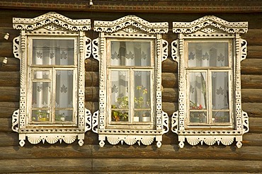 Decorated window of a Russian wooden house, village Lomovka, russia