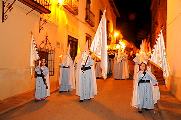 Penitents wearing penitential robes (nazareno), Holy Week procession, Semana Santa, Belmonte, Castilla-La Mancha region, Spain