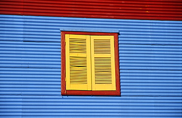 Multicoloured house front in the tourist alleys of Caminito in the docklands of La Boca, Buenos Aires, Argentina, South America