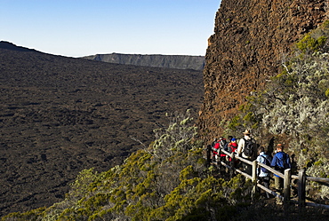 Hiker in the caldera of Piton de la Fournaise volcano, La Reunion Island, France, Africa