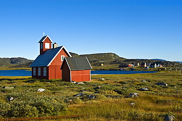 Church beside a lake and village, Ilimanaq, Greenland, North Atlantic