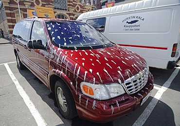 Car with pidgeon droppings, advertising for a parking garage, Stockholm, Sweden