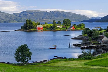 Fjord landscape with timber building on island, Vindafjord, Rogaland, Norway, Scandinavia, Europe