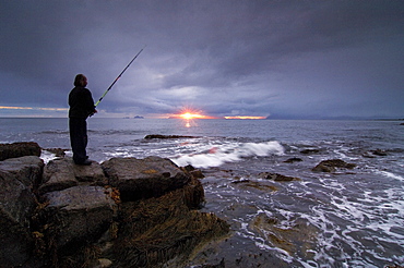 Fisherman on the beach, Lofoten Archipelago, Norway, Scandinavia, Europe