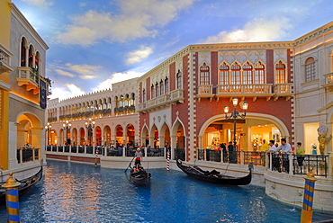 Gondola and tourists under an artificial sky in a recreated Venice, interior of the Venetian Resort Hotel & Casino on the Strip, Las Vegas Boulevard, Las Vegas, Nevada, USA, North America