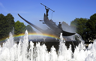 Rainbow over controversial whaling monument surrounded by a fountain created by Norwegian sculptor Knut Steen, Sandefjord, Vestfold, Norway, Scandinavia