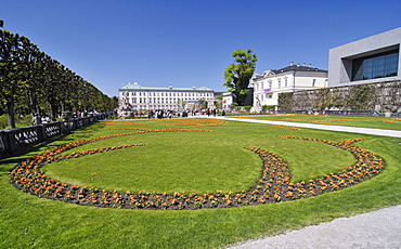 Arranged flowerbeds, Mirabellgarten or Mirabell Gardens and the Mirabell Palace, Salzburg, Austria, Europe