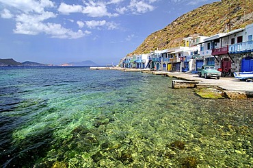 Fishing village of Klima with green sea water on Milos, Cyclades, Greece, Europe