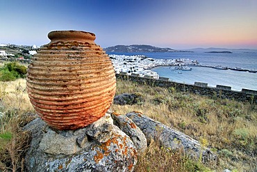 Antique clay vase in front of the old port of Mykonos, Cyclades, Greece, Europe