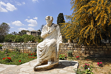 Statue of philosopher in front of the museum in Gortys. Crete, Greece, Europe