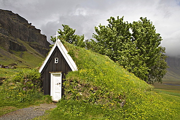 Seventeenth-century sod church, the smallest in Iceland, Nupsstaï£¿ur farmyard, southern coast of Iceland, Atlantic Ocean