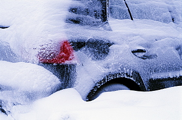 Snow-covered car