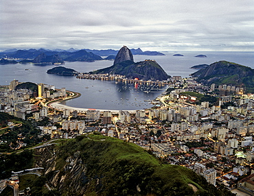 Rio de Janeiro viewed from Mt. Corcovado, Botafogo, Sugarloaf, Copacabana and Ipanema, twilight, Brazil, South America