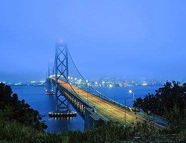 Bay Bridge, skyline at dusk, San Francisco, California, USA