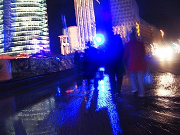 People at night at the Potsdamer square, Berlin, Germany