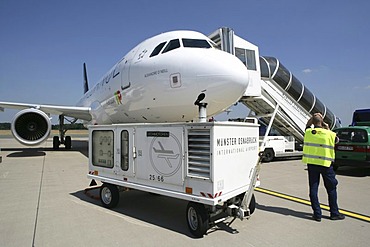 Handling of a TAP Portugal airplane Airbus A320, airport Muenster Osnabrueck, North Rhine-Westphalia, Germany