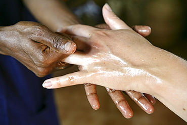 Hand massage using herb pouches, Somatheeram Ayurveda Resort, traditional Ayurvedic medicine spa resort in Trivandrum, Kerala, India, Asia