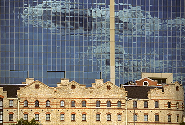 Old harbour building in front of modern glass office building, Darling Harbour, Sydney, New South Wales, Australia