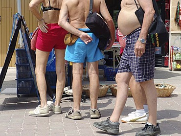 ESP, Spain, Balearic Islands, Mallorca : Half naked tourist, in bathing suits, on a market in Alcudia.