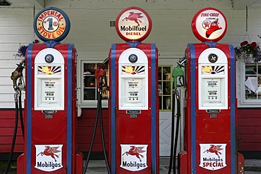 USA, United States of America. Gustavus : Historical Gas station, with old gas pumps.