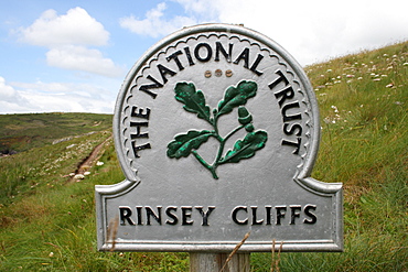 Sign " The National Trust" at the Rinsey Cliff, Cornwall, UK