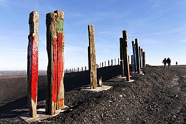 "Totems" art installation by Basque artist Augustin Ibarrola, painted railway ties at the top of the Haniel spoil pile, Bottrop, North Rhine-Westphalia, Germany, Europe