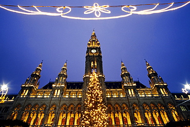 Illuminated city hall building, Christmas decorations, evening, Vienna, Austria, Europe