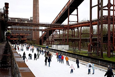 Ice-skating in front of the disused coking plant Zollverein, Essen, NRW, Germany